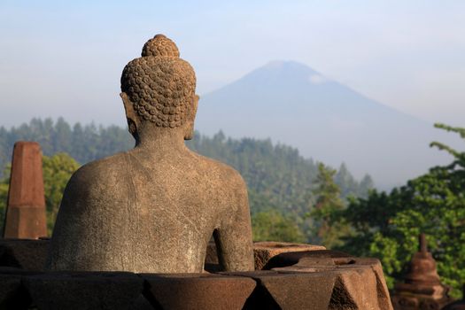 Buddha Statue at Borobudur Temple Ruin in Yogyakarta Java Indonesia.