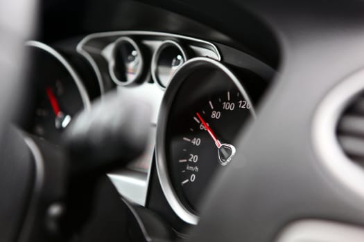 Illuminated car dashboard in red and black