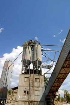 Factory details on a background of the sky