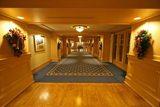 A look down a long hotel corridor