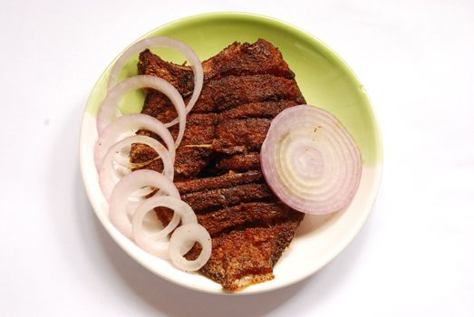 Indian pearl sport fish fry with onion