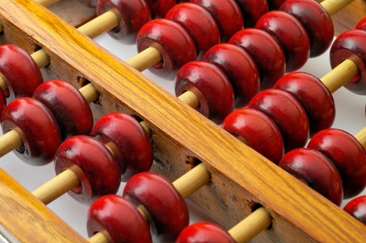 Chinese abacus macro closeup shwing both rows