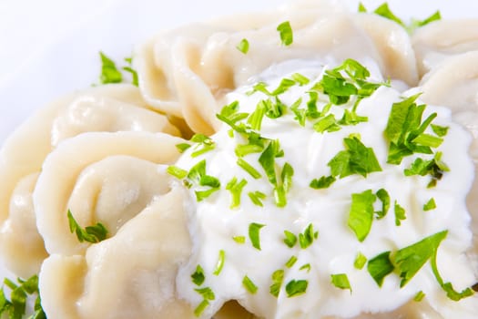 Ravioli in sauce and minced parsley