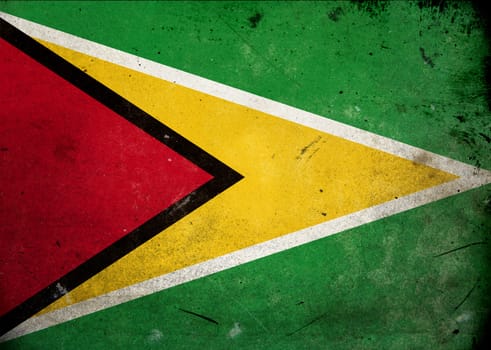 The flag of Guyana on old and vintage grunge texture