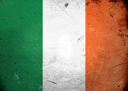 The flag of Ireland on old and vintage grunge texture