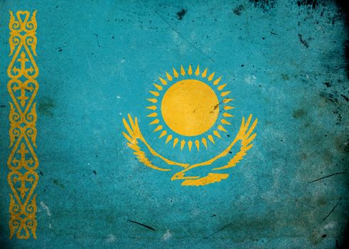 The flag of Kazakhstan on old and vintage grunge texture