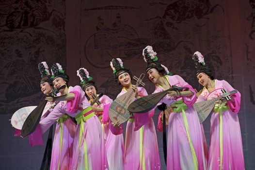 CHENGDU - JUN 6: Chinese Gaojia Opera performer make a show on stage to compete for awards in 25th Chinese Drama Plum Blossom Award competition at Jinsha theater.Jun 6, 2011 in Chengdu, China.
Chinese Drama Plum Blossom Award is the highest theatrical award in China.