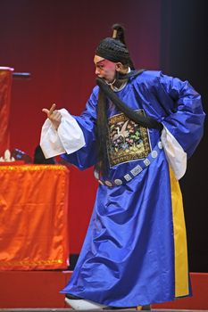 CHENGDU - JUN 5: chinese Sichuan opera performer make a show on stage to compete for awards in 25th Chinese Drama Plum Blossom Award competition at Chongzhou theater.Jun 5, 2011 in Chengdu, China.
Chinese Drama Plum Blossom Award is the highest theatrical award in China.