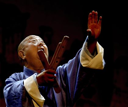 CHENGDU - MAY 23: The chinese Rap music show "JINQIANBAN" performed by the famous blind artist Zou Zhongxin(He is eighty seven years old now.) at Golden theater during the 1st International Festival of the Intangible Cultural Heritage China,2007.May 23, 2007 in Chengdu, China.