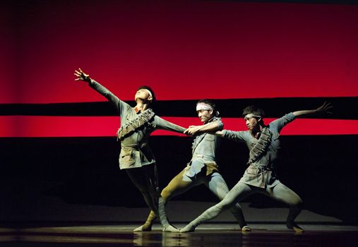 CHENGDU - MAY 25: Chinese Modern Dance Drama Red Army's flower perform on stage at Xinan theater on May 25, 2011 in Chengdu, China.