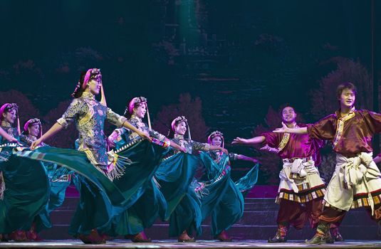 CHENGDU - SEP 27: chinese Tibetan ethnic dancers perform on stage at Sichuan experimental theater.Sep 27,2010 in Chengdu, China.