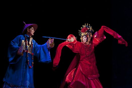 CHENGDU - JUN 3: chinese Cantonese opera performer make a show on stage to compete for awards in 25th Chinese Drama Plum Blossom Award competition at Jinsha theater.Jun 3, 2011 in Chengdu, China.
Chinese Drama Plum Blossom Award is the highest theatrical award in China.