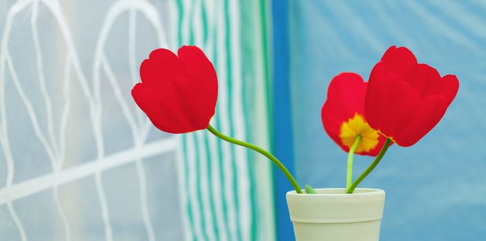 red tulips in a vase