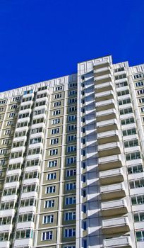 A modern high rise building with balconies