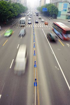 High speed and blurred traffic trails in downtown