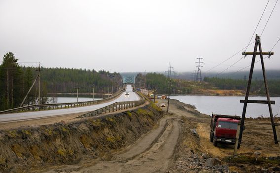 Construction of a new road bridge in the background nature of the north