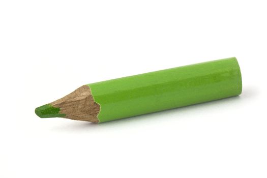 Small green pencil isolated on white background