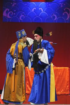 CHENGDU - JUN 5: chinese Sichuan opera performer make a show on stage to compete for awards in 25th Chinese Drama Plum Blossom Award competition at Chongzhou theater.Jun 5, 2011 in Chengdu, China.
Chinese Drama Plum Blossom Award is the highest theatrical award in China.