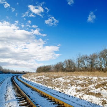 railroad to sunset. winter time