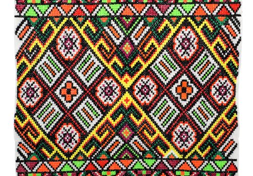 embroidered good by cross-stitch pattern. ukrainian ethnic ornament