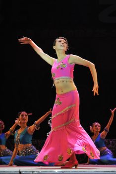 CHENGDU - SEP 28: chinese Dai ethnic dancer performs on stage in the 6th Sichuan minority nationality culture festival at JINJIANG theater.Sep 28,2010 in Chengdu, China.