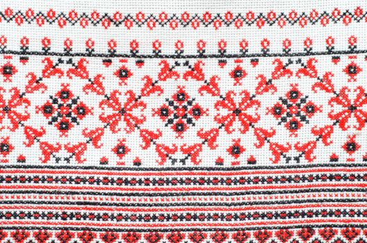 embroidered good by cross-stitch pattern. ukrainian ethnic ornament