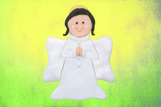 funny angel first communion card of sugar, on colorful background