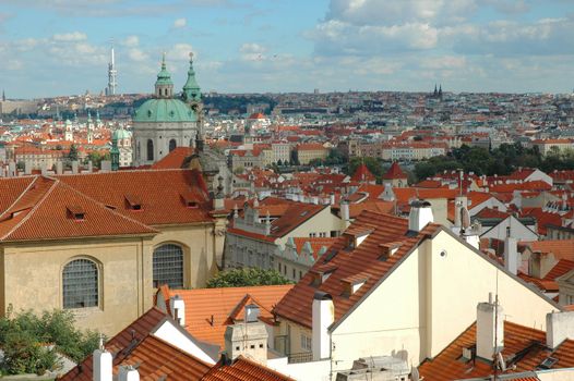 St. Nicholas Church and the red roofs in Lesser Town, Prague, Czech Republic