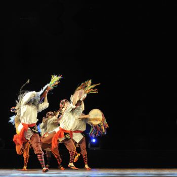 CHENGDU - SEP 28: chinese Qiang ethnic dancers perform on stage at Sichuan experimental theater.Sep 28,2010 in Chengdu, China.