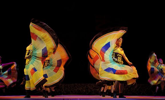 CHENGDU - SEP 28: chinese Yi ethnic dance in the 6th Sichuan minority nationality culture festival at JINJIANG theater.Sep 28,2010 in Chengdu, China.