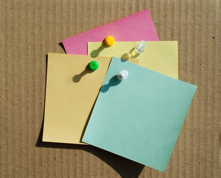 color notepaper and clips