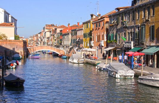A canal lined with buildings in Venice, Italy.
