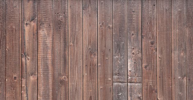 A simple background texture of a wooden fence.