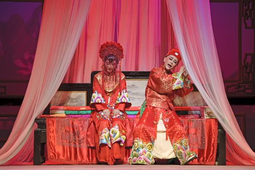 CHENGDU - JUN 3: chinese Yue opera performer make a show on stage to compete for awards in 25th Chinese Drama Plum Blossom Award competition at Experimental theater.Jun 3, 2011 in Chengdu, China.
Chinese Drama Plum Blossom Award is the highest theatrical award in China.