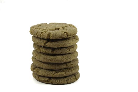 stack of ginger snap cookies isolated on a white background