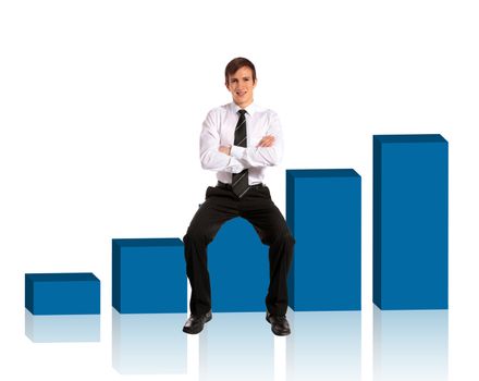 A young businessman sitting on a bar diagram. All isolated on white background.