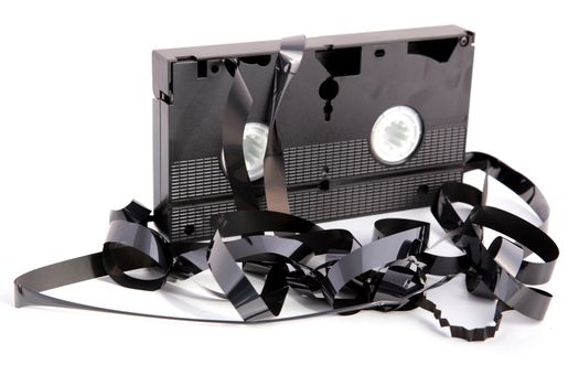 A broken VHS cassette. All isolated on white background.