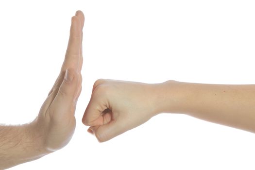 A human hand punching another hand. All isolated on white background.