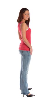 An attractive young woman standing in front of a plain white background.