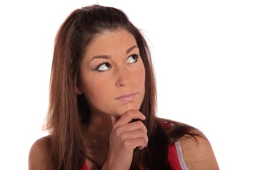 A young attractive woman deliberates a decision. All isolated on white background.