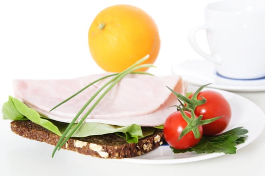 Fine served granary bread with boiled ham. All on white background.