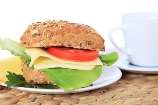 Fine served multi-grain roll with cheese. All on white background.