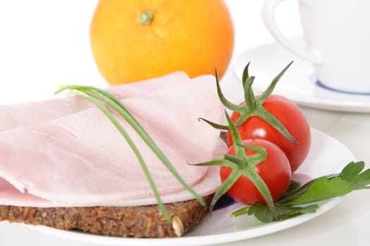 Fine served granary bread with boiled ham. All on white background.