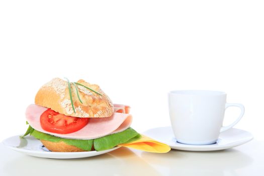 Fine served french roll with boiled ham. All on white background.