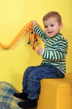 Cute european toddler in kindergarten.