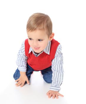 Cute caucasian toddler crawling. All isolated on white background.