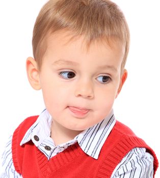 Portrait of a cute caucasian toddler looking to the side. All isolated on white background.