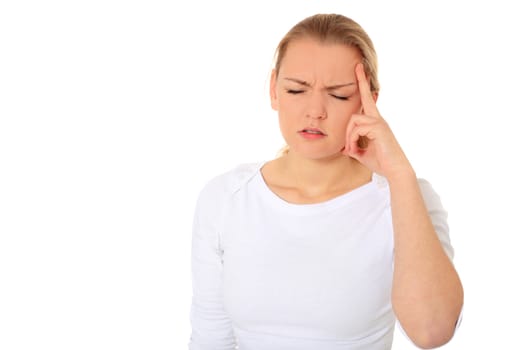 Attractive blond woman suffering from headache. All on white background.