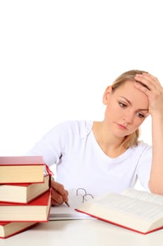 Attractive blond student suffering from examination stress. All on white background.