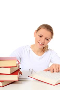 Attractive blond woman studying. All on white background.